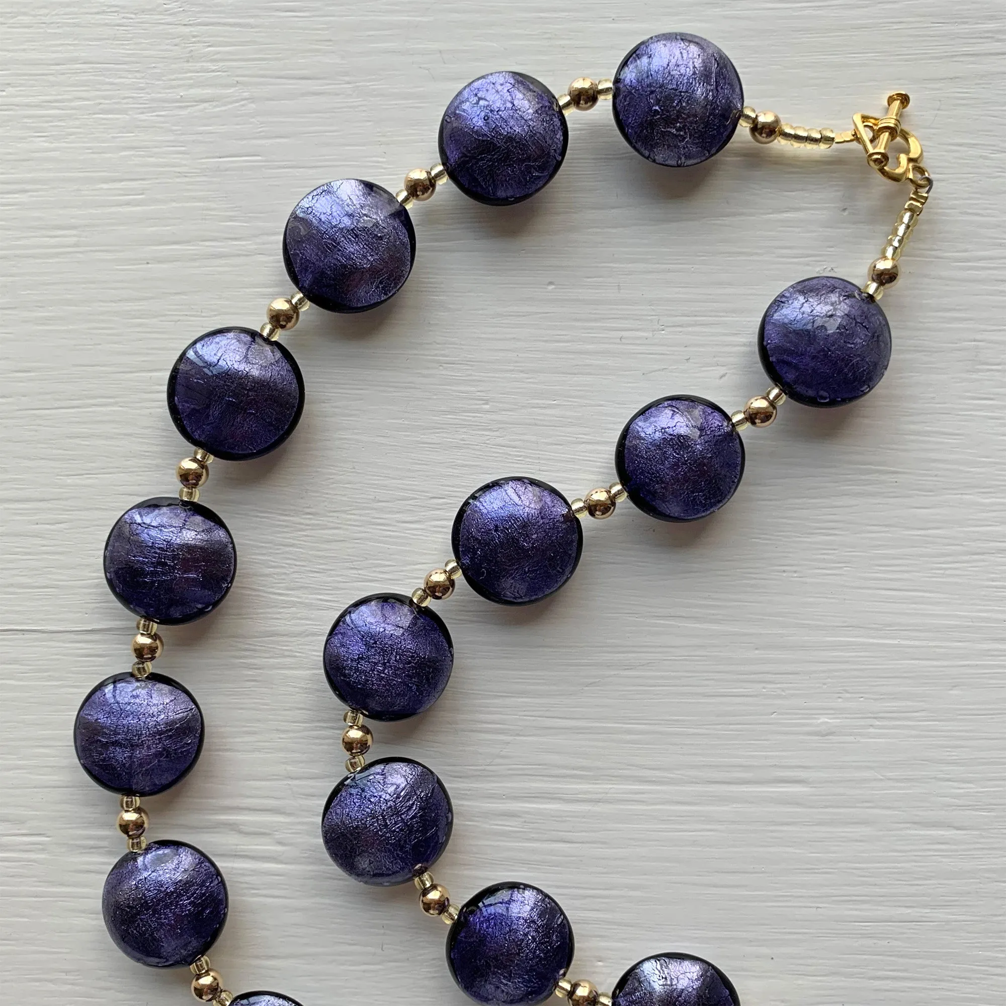 Necklace with purple velvet Murano glass medium lentil beads on gold