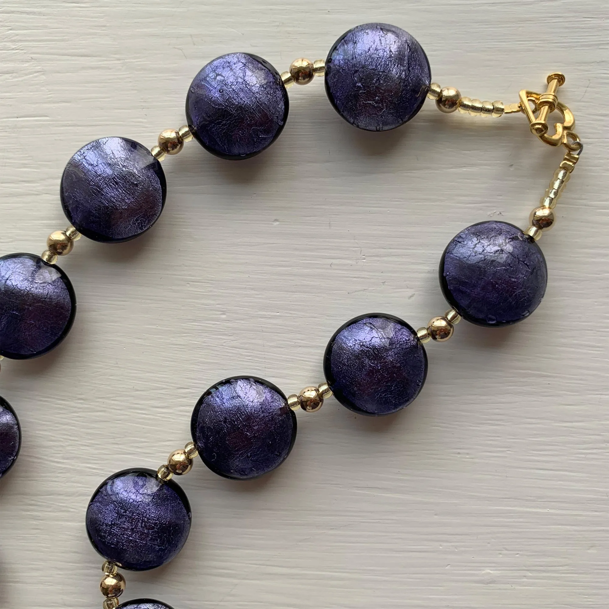 Necklace with purple velvet Murano glass medium lentil beads on gold